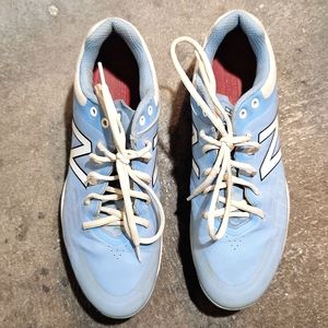 New Balance, light blue baseball cleats size 10